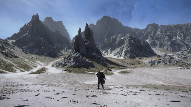 Sam Bridges stands in a desert landscape, surrounded by dead fish.